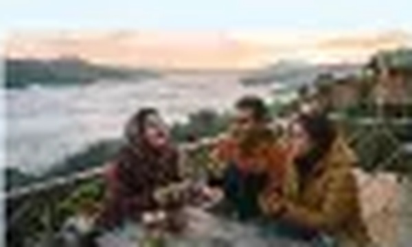 Friends group enjoying sunset at Sajek Valley resort terrace